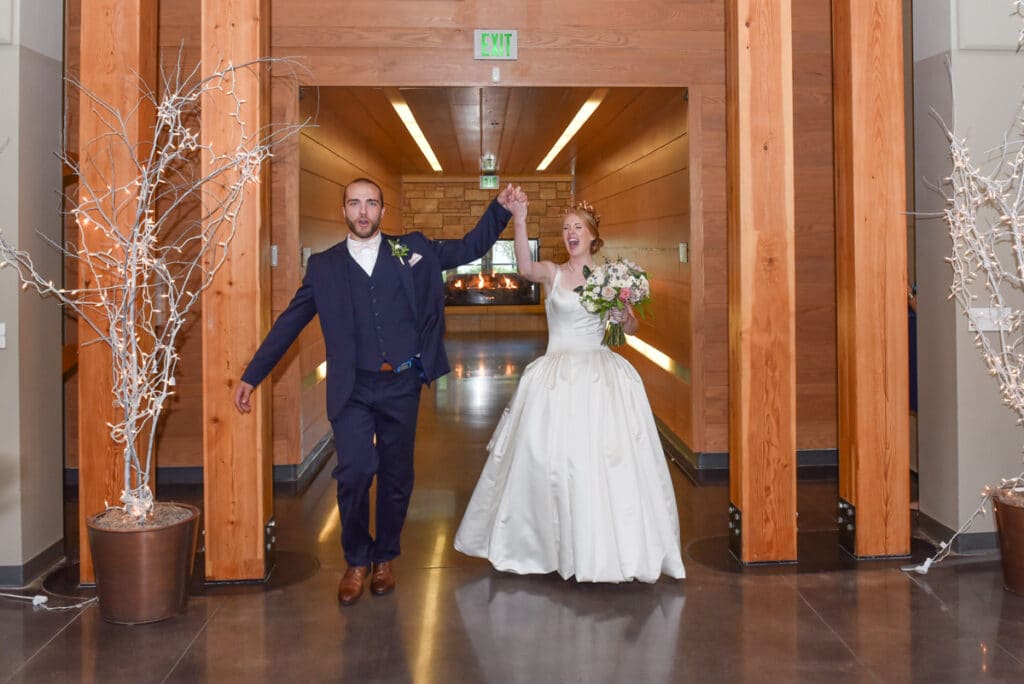 Bride & Groom entering their Vadnais Heights Commons Wedding